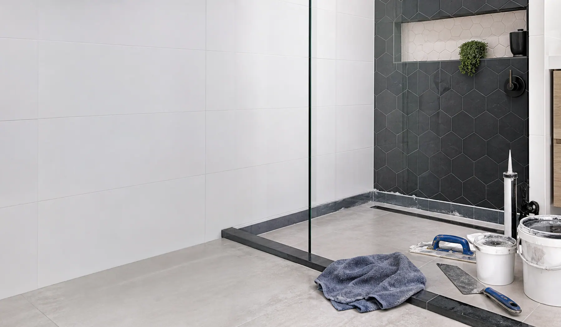 Modern bathroom wet area prepared for waterproofing and tile repair